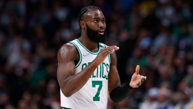 Jaylen Brown claps his hands.